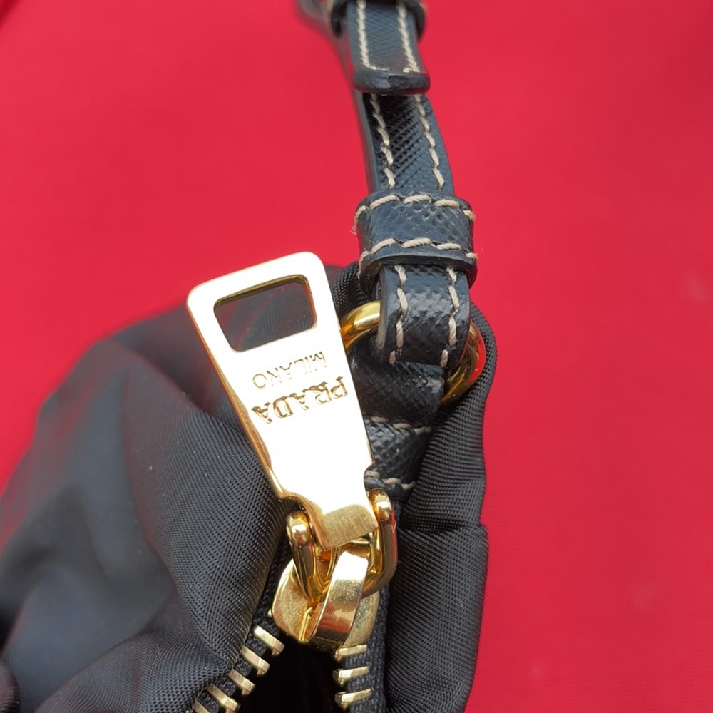 ⛔️SOLD⛔️ PRADA Black Wristlet with Gold accents. - Picture 8 of 16